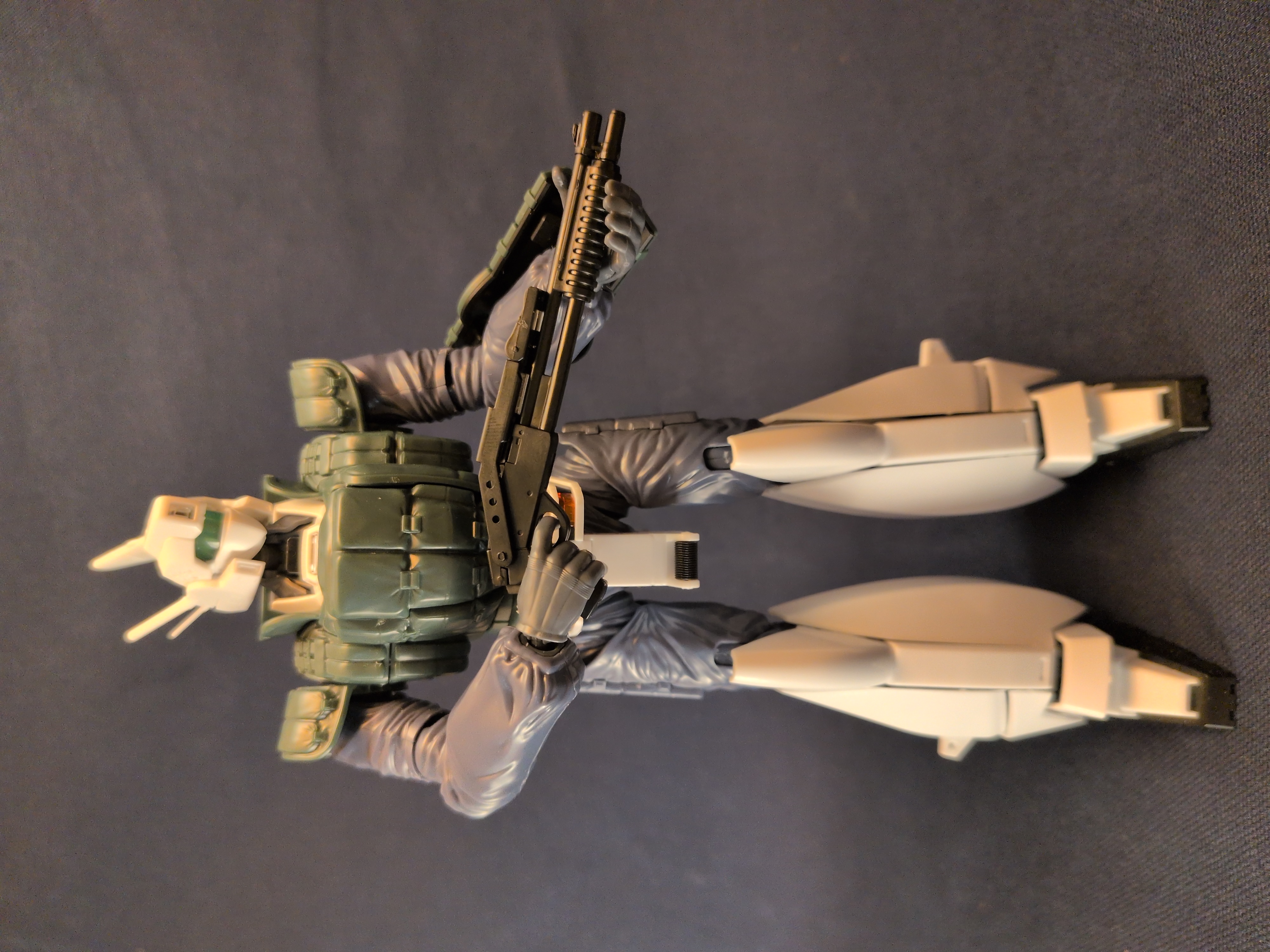 patlabor with riotgun in low ready position