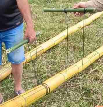 Bamboo lifting Tool. Tied on the left, loose on the right