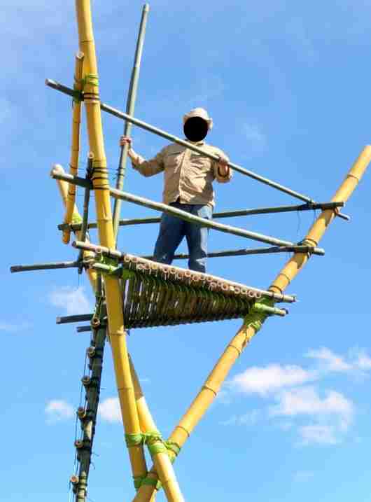 Akelas standing on the tower with finished handrails